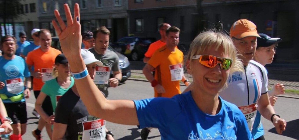 Kuva, jossa maratonjuoksija