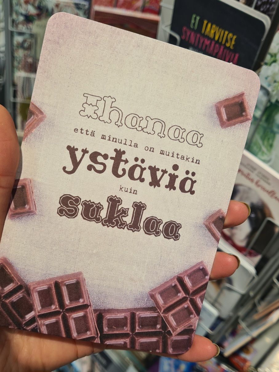 postikortti, jossa suklaalevyn kuva